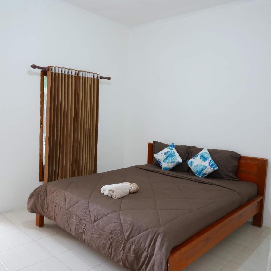 Rumah Side Apartamento Gili Trawangan Exterior foto